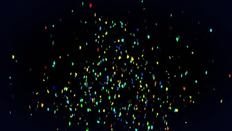 Animation-of-colourful-confetti-falling-on-black-background