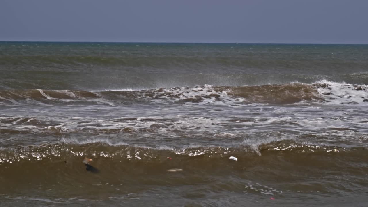 Waves in ocean at marina beach, triplicane, chennai, tamil nadu, india. day time, stable shot, 4k.