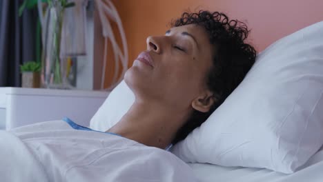 Female-patient-lying-in-a-hospital-bed