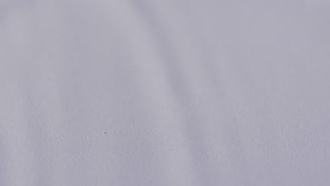 video of drop of water with copy space on white background