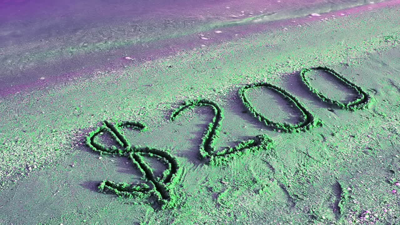Innskrift på 200 dollar. Fotografering på stranden.
