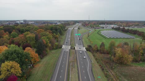 drone view of large highway with solar panels