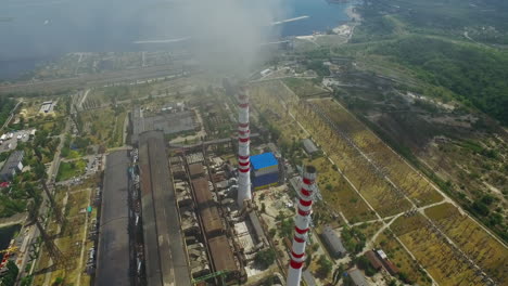 Distrito-Industrial-De-Fábricas-Con-Chimeneas.-Vista-Aérea-De-Drones-Zona-Industrial.