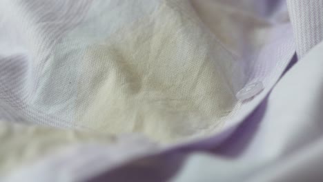 close-up of a stained purple shirt