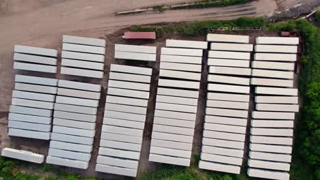 top-down-aerial-of-parking-lot-with-many-semi-trucks-and-trailers---reefers,-dry-vans