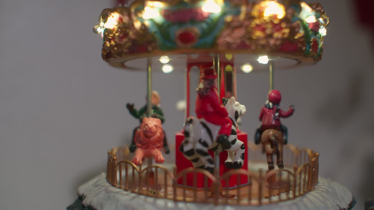 Miniature Illuminated Carousel Rotating with Figurines