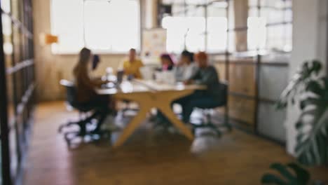 startup business background. blurred shot of creative team working at office