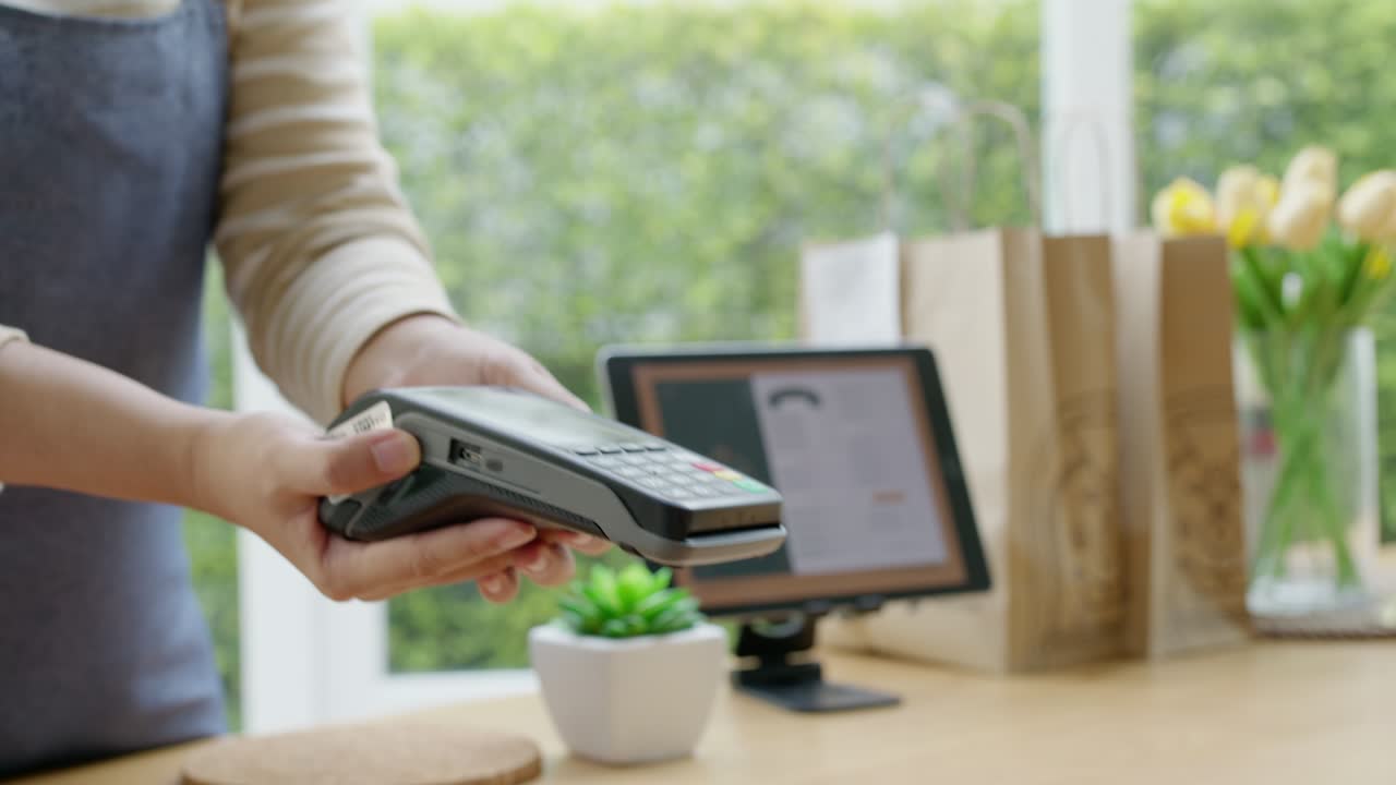 Mobile phone contactless paying cashless e-wallet digital payment.