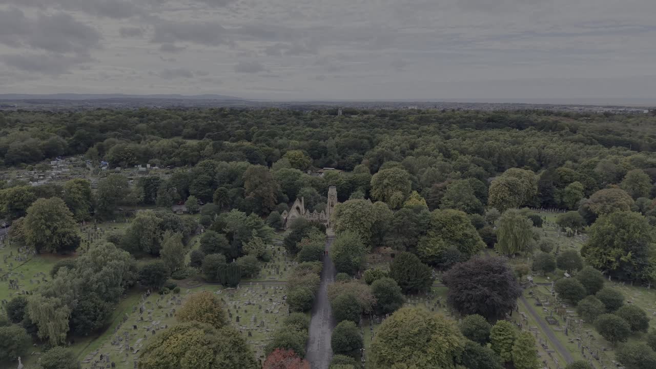 Flaybrick Memorial Gardens - place of mythical legends and ghost stories - aerial dronie revealing Bidston Hill - Wirral, UK