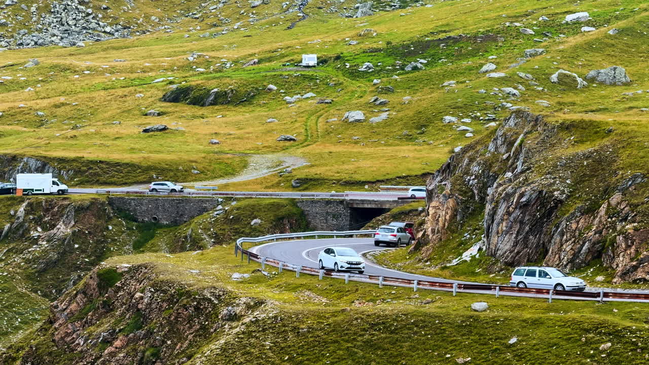 Scenic drive on the Transfagarasan highway. Beautiful landscape view of the Transfagarasan highway winding through the Carpathian Mountains of Romania