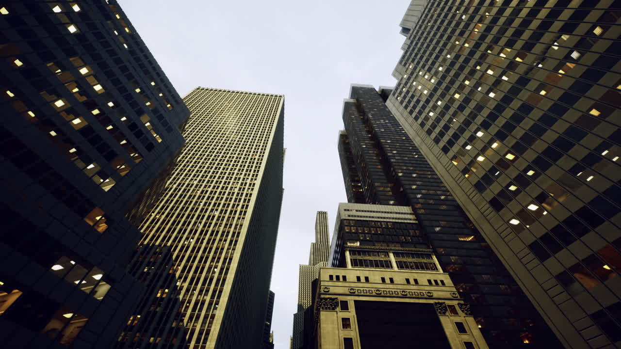 High rise buildings in a bustling city under a cloudy sky during evening hours