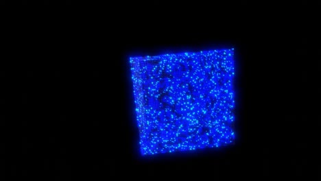 beautiful transform of object from particles in force field into abstract beautiful art object of glow particles, beautiful pattern in air, bend surface and curls structure. 3d art performance as bg