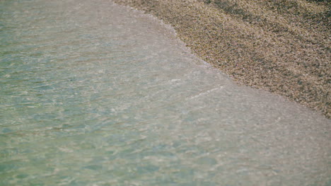 waves at sunset at rocky shore