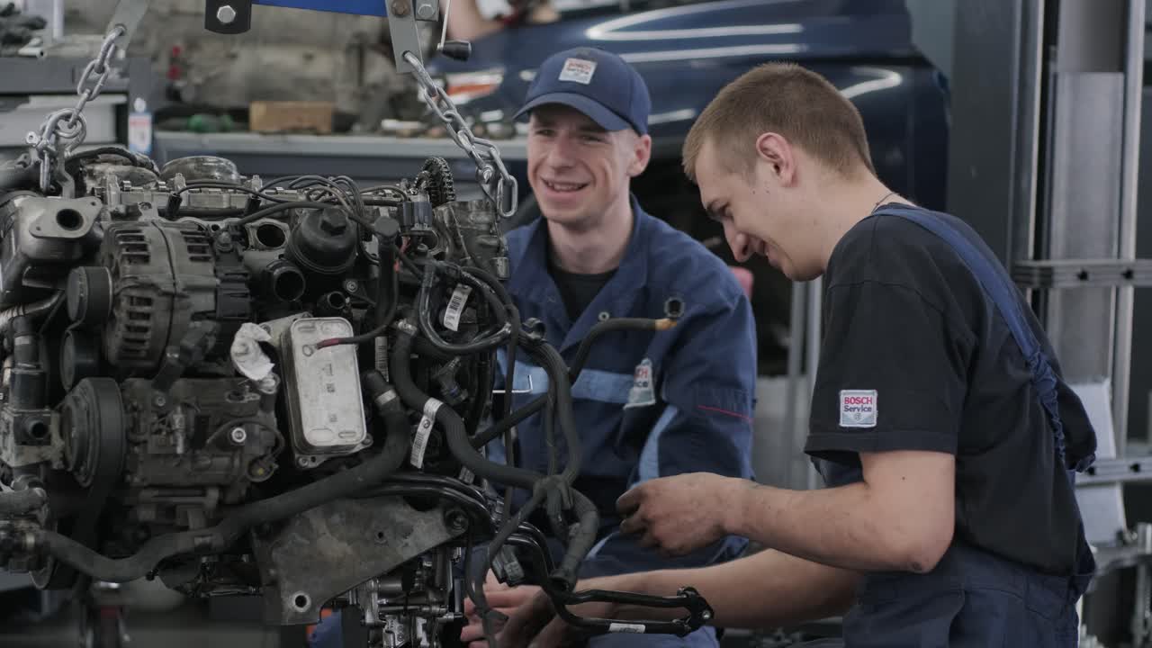 Car Engine Repair by Mechanics in a Workshop