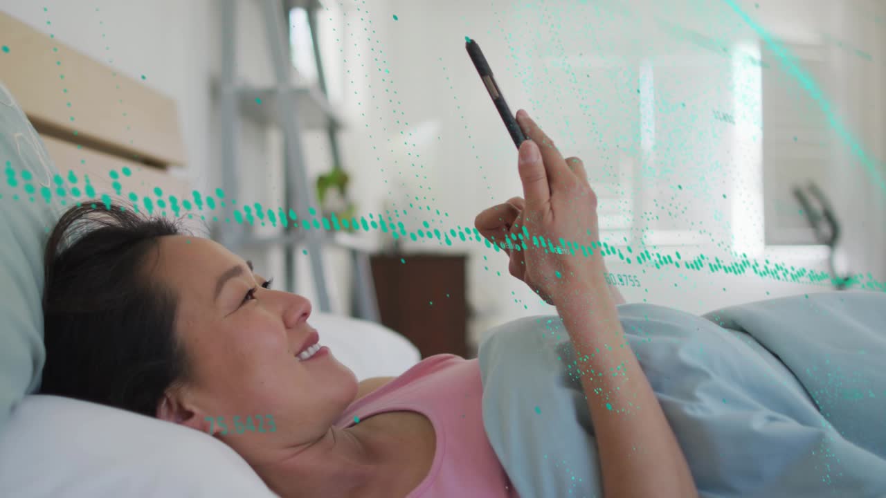 Woman reaching for smartphone scrolling content as teal data flow forming around phone in tech demo