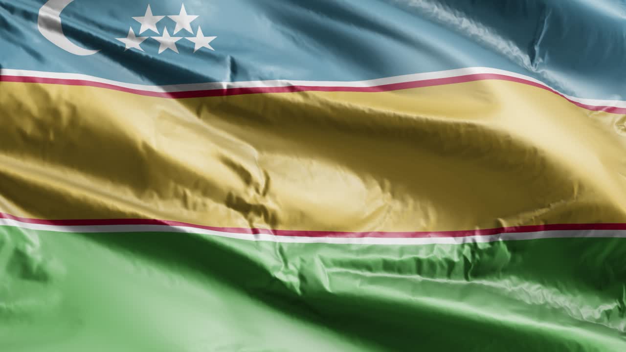 la bandera de karakalpakstán se agita lentamente en el bucle del viento. la bandera de karakalpakstan se balancea suavemente en la brisa. el fondo de relleno completo. 20 segundos de bucle.