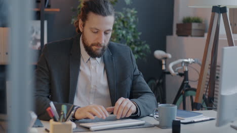 businessman working at desk in modern office