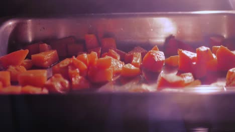 grilling butternut in oven, panning shot