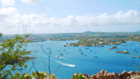 luxury yacht sailing through the spanish waters harbor in curacao, caribbean