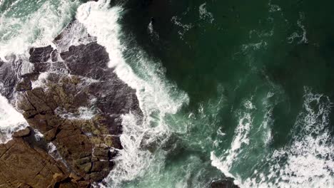 drone aerial pan shot of coastline rocky ocean waves and reef central coast nsw australia 3840x2160 4k