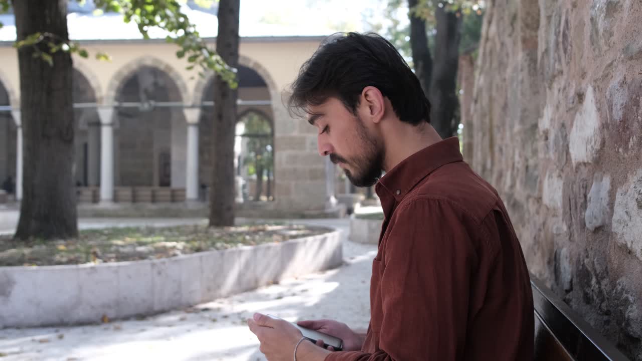 Man Looking In Mosque Garden