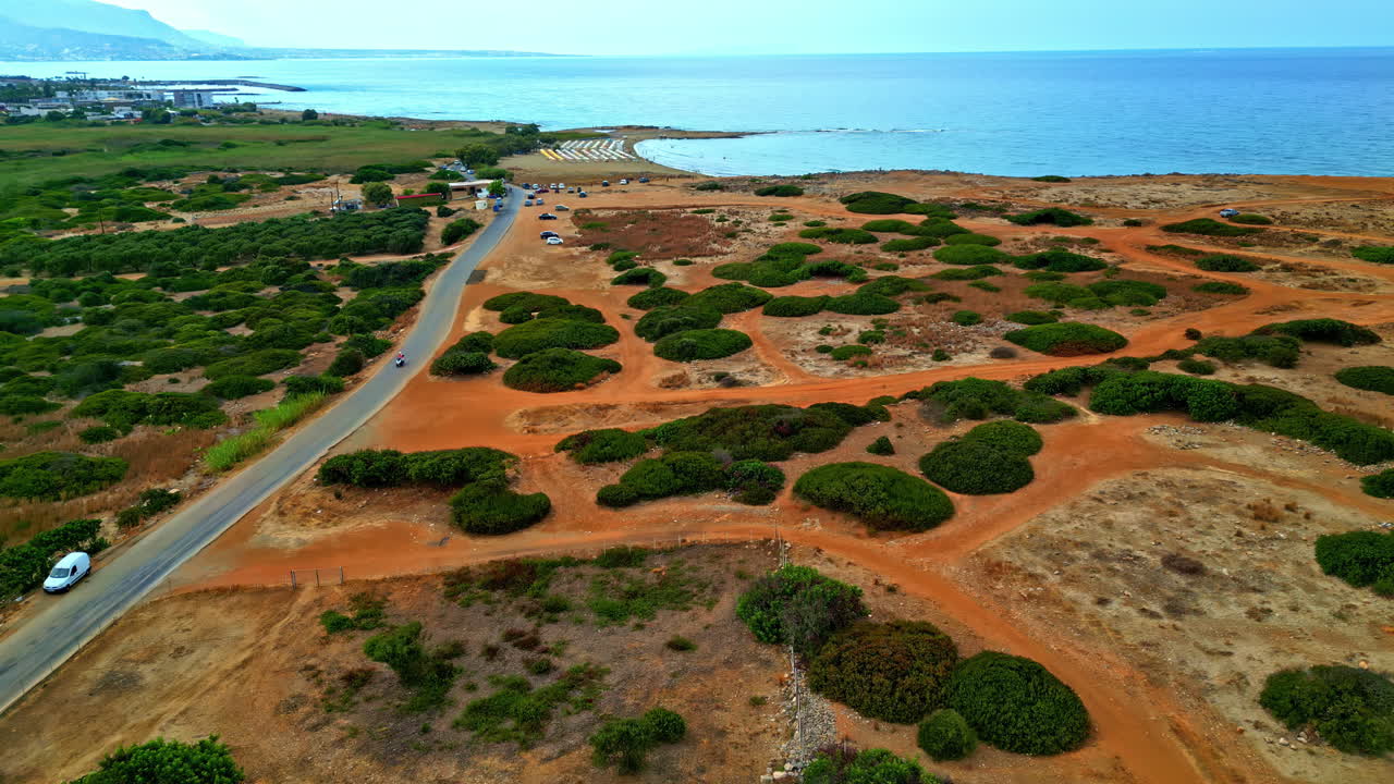 Historical ancient ruin site near coast of beautiful Mediterranean sea in Crete island, aerial