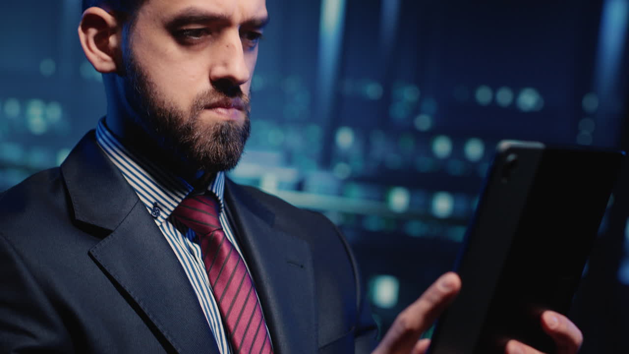 IT technician running hosting server diagnostics on tablet