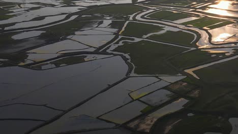 high aerial drone view of vast flooded countryside landscape fields, sylhet