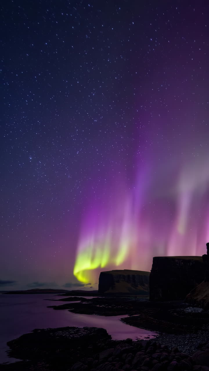 Vibrant Aurora Borealis Over Coastal Cliffs