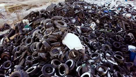 aerial view old rubber, tyres, in recycling factory