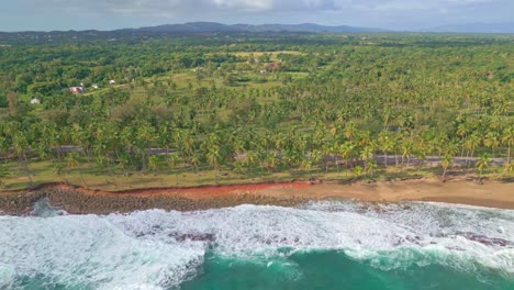 rough sea breaking along nagua coast and shore in dominican republic