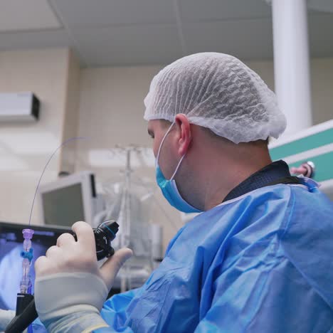 group of doctors perform an operation to a patient. surgeons in medical uniform and masks working in the operating room.