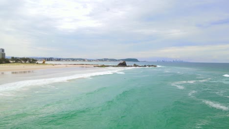 panorama of currumbin beach and blue sea at daytime in gold coast, australia