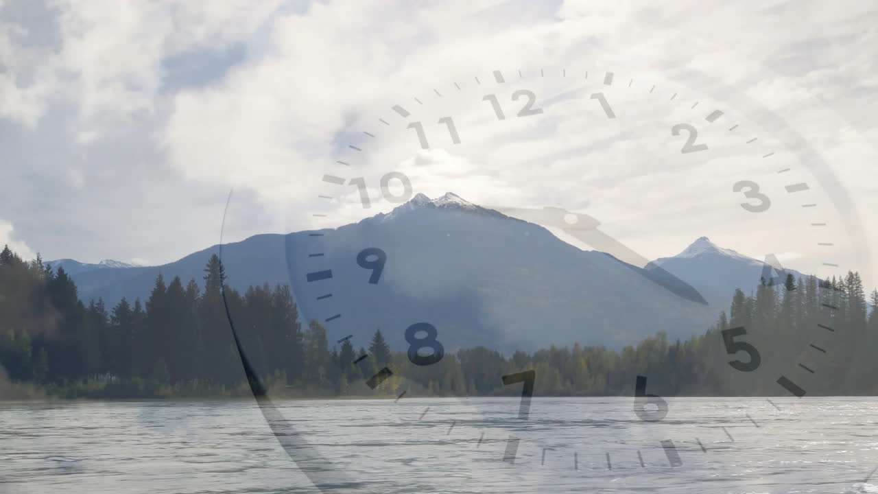 Clock face animation over serene mountain lake landscape with cloudy sky