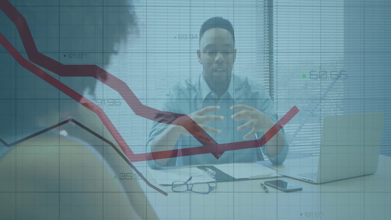 Consultant leaning forward and initiating two colored trend lines on grid showing business insights