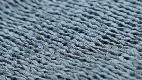 fine green knitwork fine texture close-up slow tilt 4k 2160p 30fps ultrahd footage - knitting made sweater texture details shallow dof 3840x2160 uhd tilting video