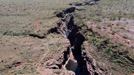 Drone-aerial-flying-towards-Joffre-gorge-and-waterfall-in-Karijini-national-park