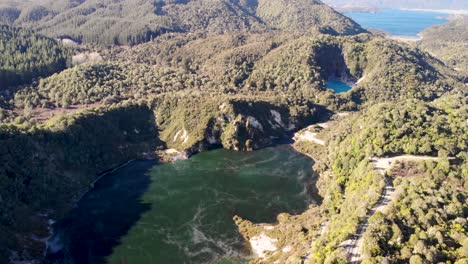 Waimangu-Volcanic-Valley-aerial-birds-eye-view-shot-of-large-hot-springs-and-New-Zealand-landscape