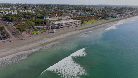 turquoise sea and cityscape of the coastal city of oceanside, ca, usa