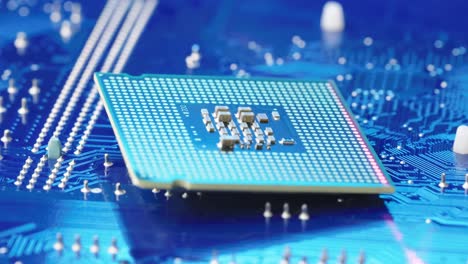 microchip de escaneo de luz roja sobre placa de circuito impreso para análisis, fondo azul
