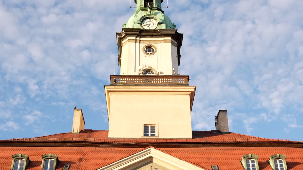 Jelenia Gora Town Hall with clock and spire. Historic city in southwestern Poland