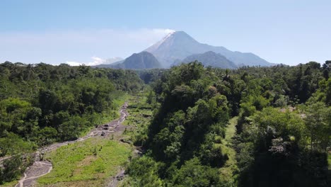 Aerial-view,-Mount-Merapi-in-the-morning-when-it-emits-eruption-smoke-and-the-weather-is-very-sunny-in-Yogyakarta