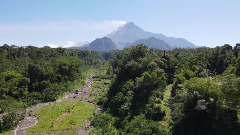 aerial view, mount merapi in the morning when it emits eruption smoke and the weather is very sunny in yogyakarta