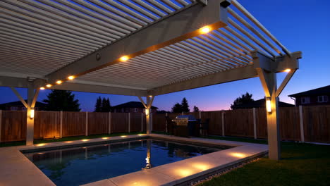 evening poolside pergola with grill