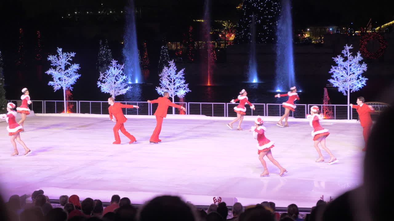 Enchanting Holiday Ice Skating Show with Fountains and Lights