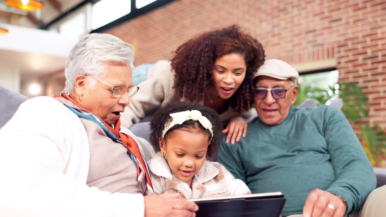 Grandfamily using a tablet together