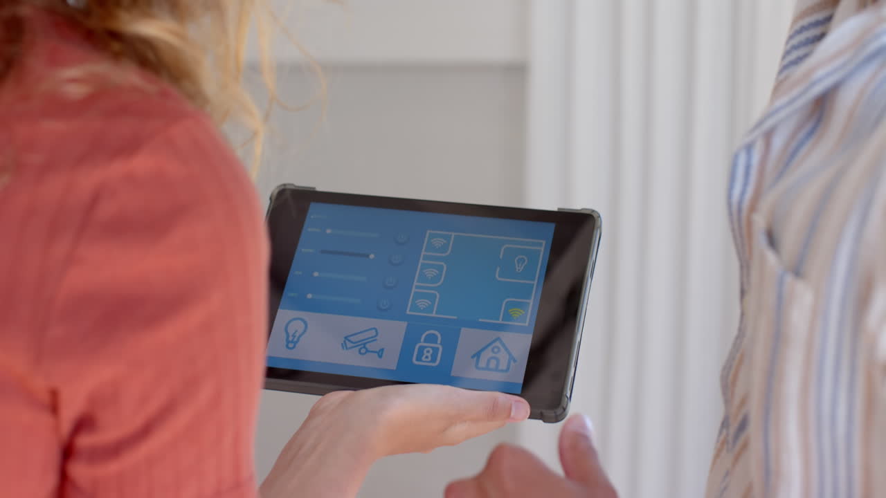 Using tablet to control smart home features, focusing on technology and convenience