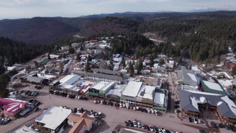 aerial drone shot of cloudcroft, new mexico main street, pull back and tilt up