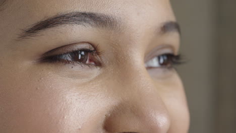 close up beautiful young woman eyes looking happy hispanic female smiling expression satisfaction