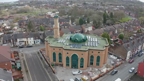 the new mosque being built for the growing muslim community to worship and congregate